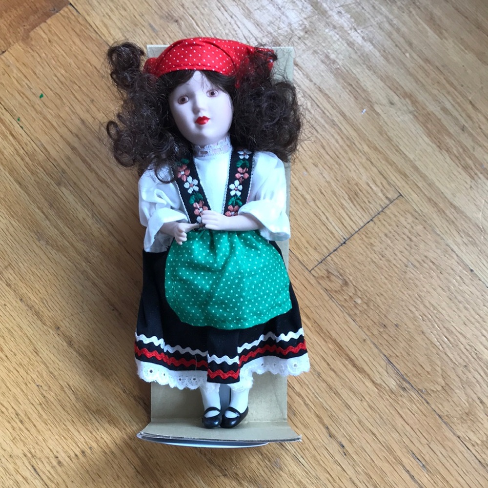 Danbury Mint Vintage porcelain Dutch doll on stand 8in.